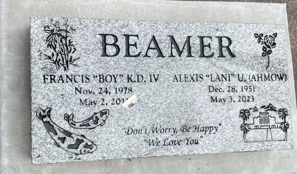 Gray granite Beamer companion marker with engraved names and decorative artwork
